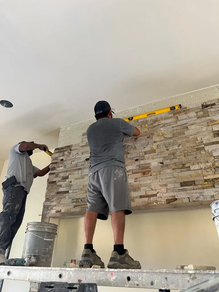 Stone veneer installation in progress